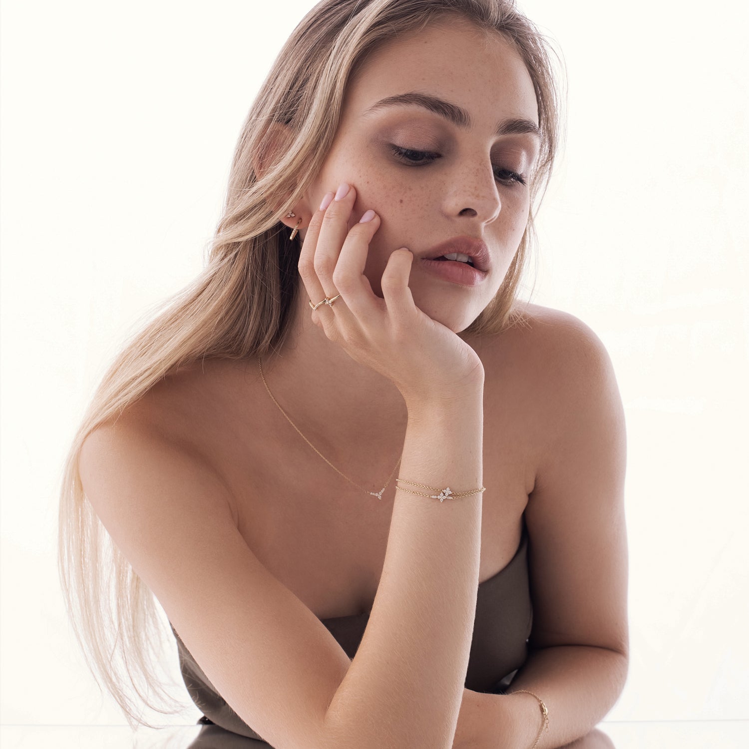 Gold bracelet for women set with 4 diamonds