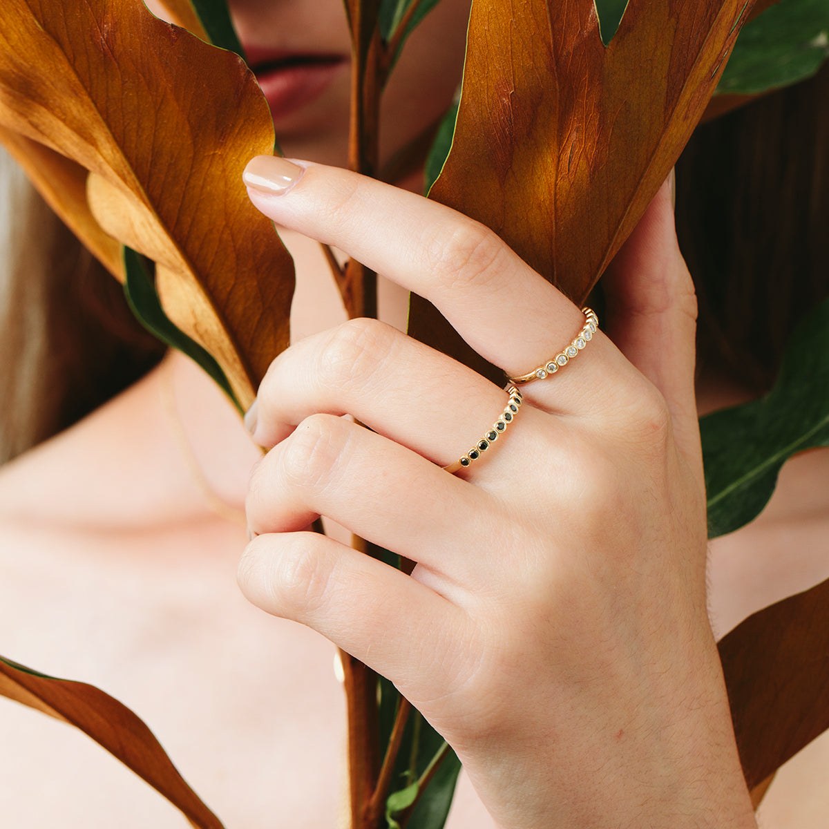 Black diamond ring in glass setting