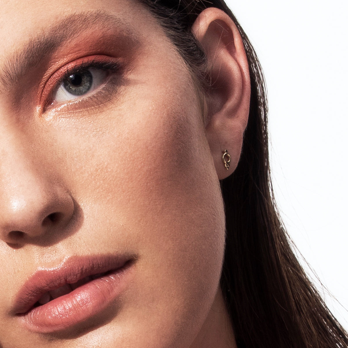 Gold stud earrings in Indian style