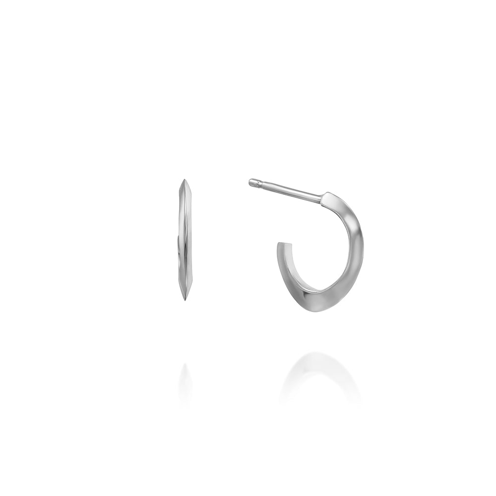 Small attached gold hoop earrings in the shape of a drop