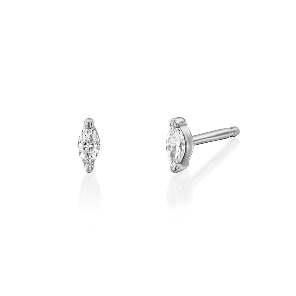 Marquise-cut gold and diamond earrings with teeth (10 points)