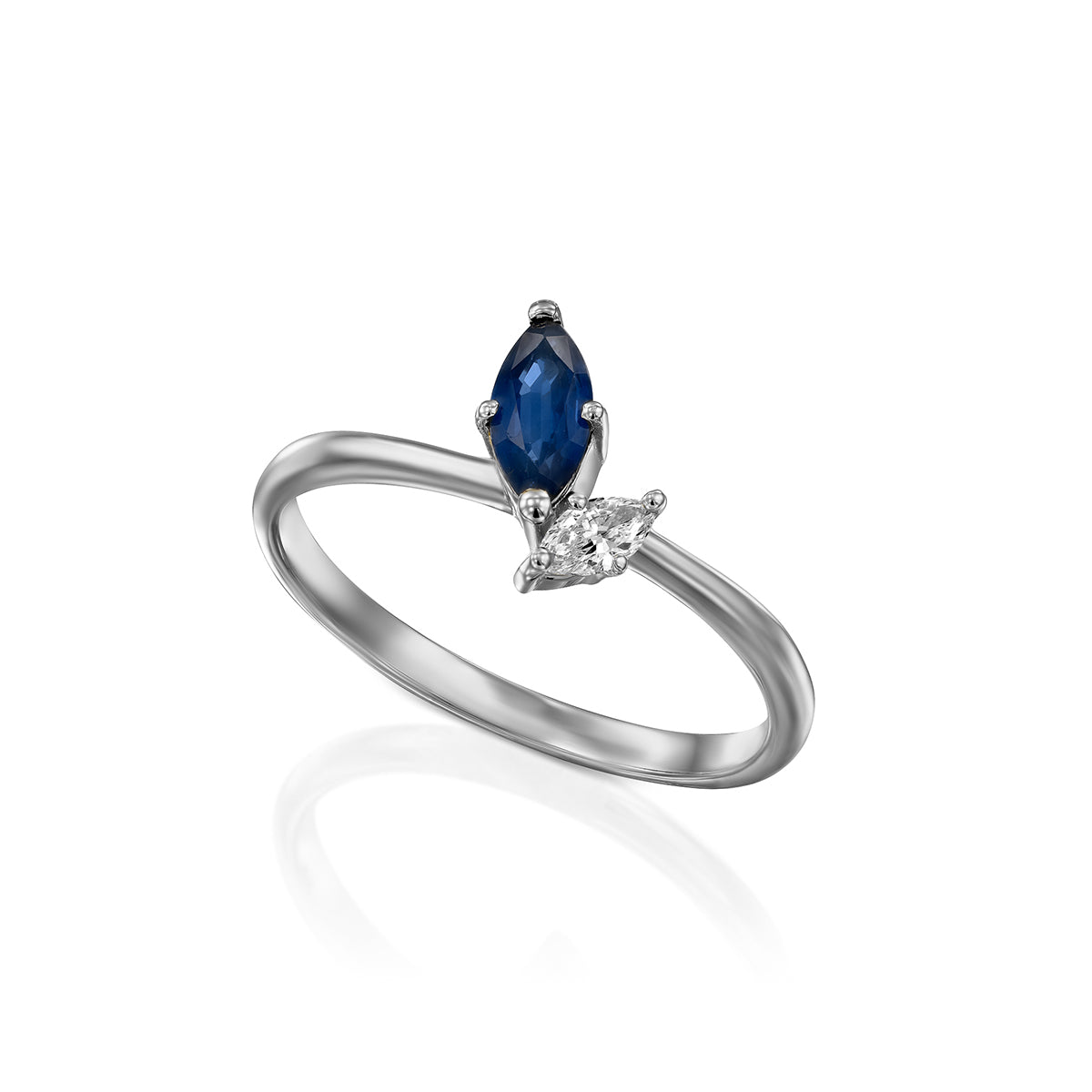 A special gold ring set with a diamond and sapphire in the shape of a marquise
