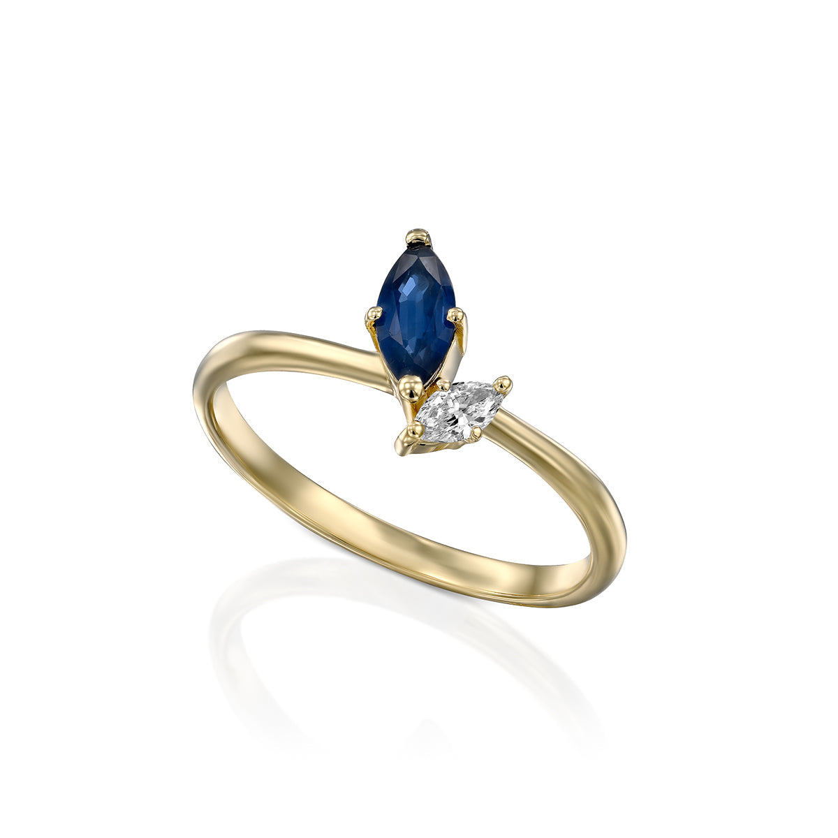 A special gold ring set with a diamond and sapphire in the shape of a marquise