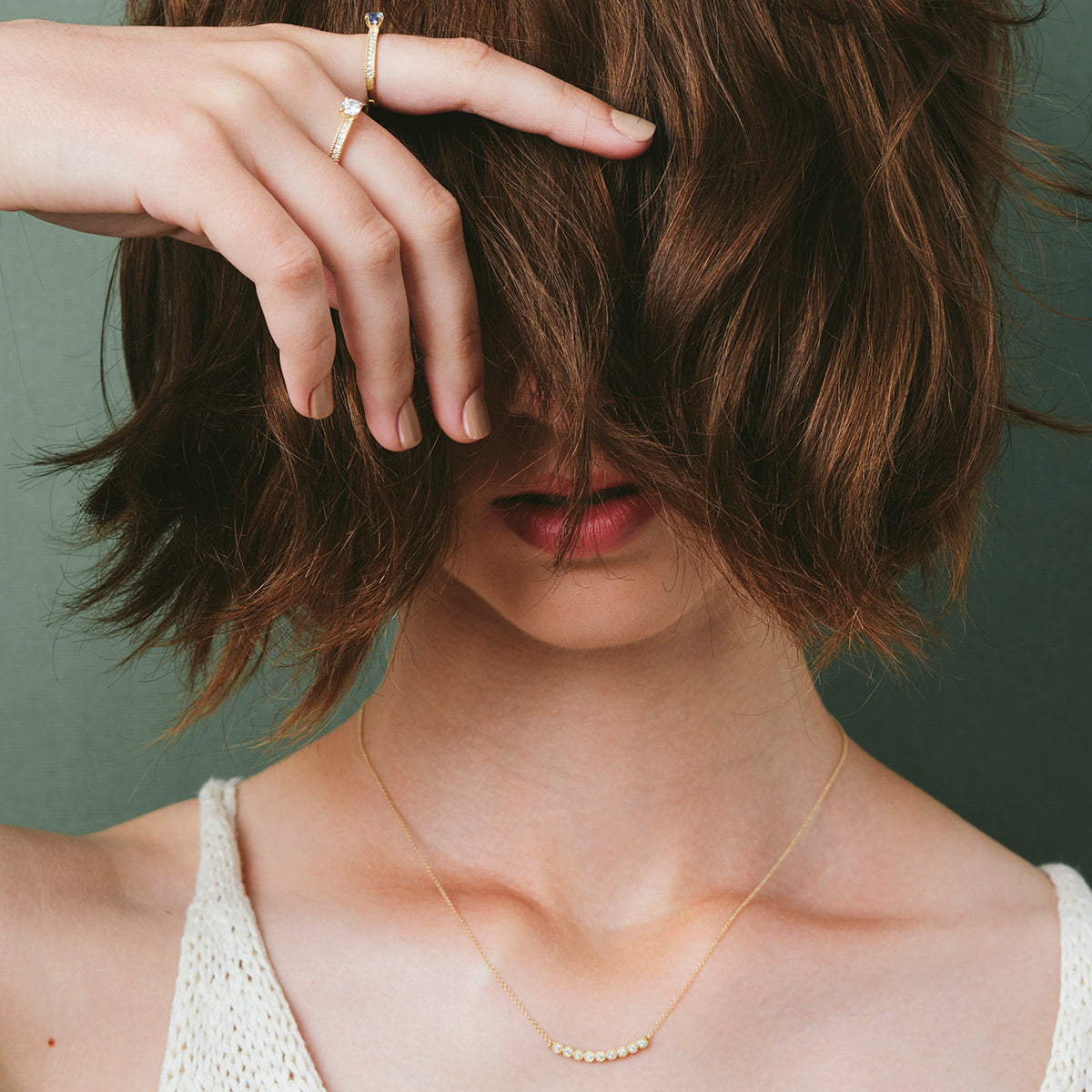 Gold chain and horizontal row of diamonds