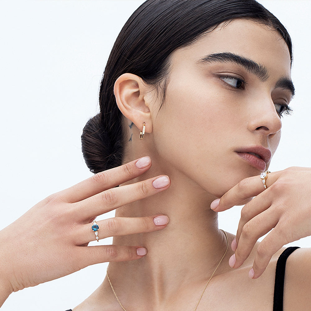 Hexagon geometric hoop earrings studded with diamonds