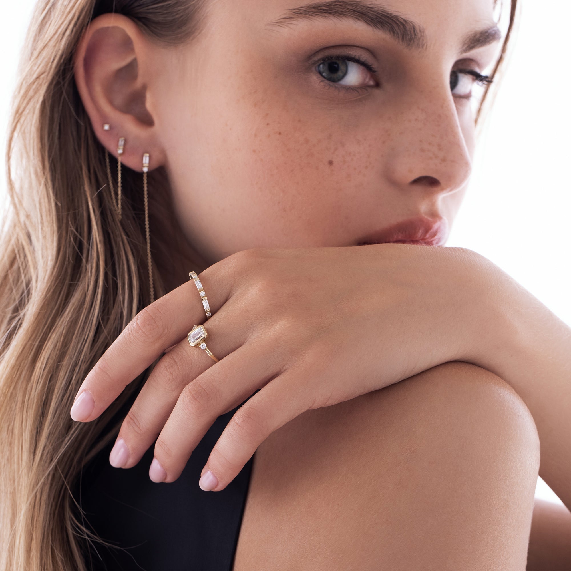 A special gold chain earring set with lab diamonds in a baguette and circle cut