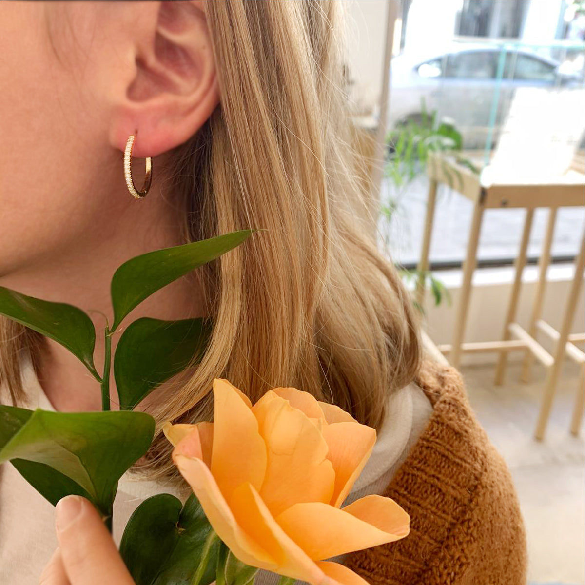 Large gold hoop and diamond earrings