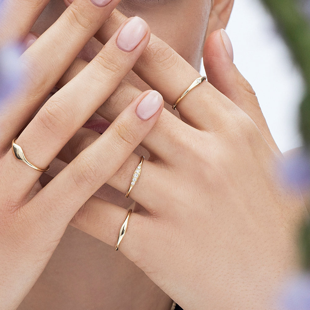 A fine gold ring studded with diamonds