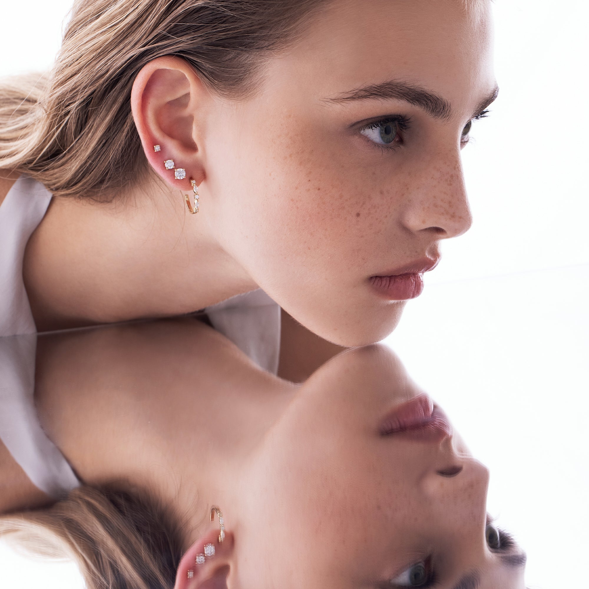 Special gold hoop earrings set with baguette-cut laboratory diamonds