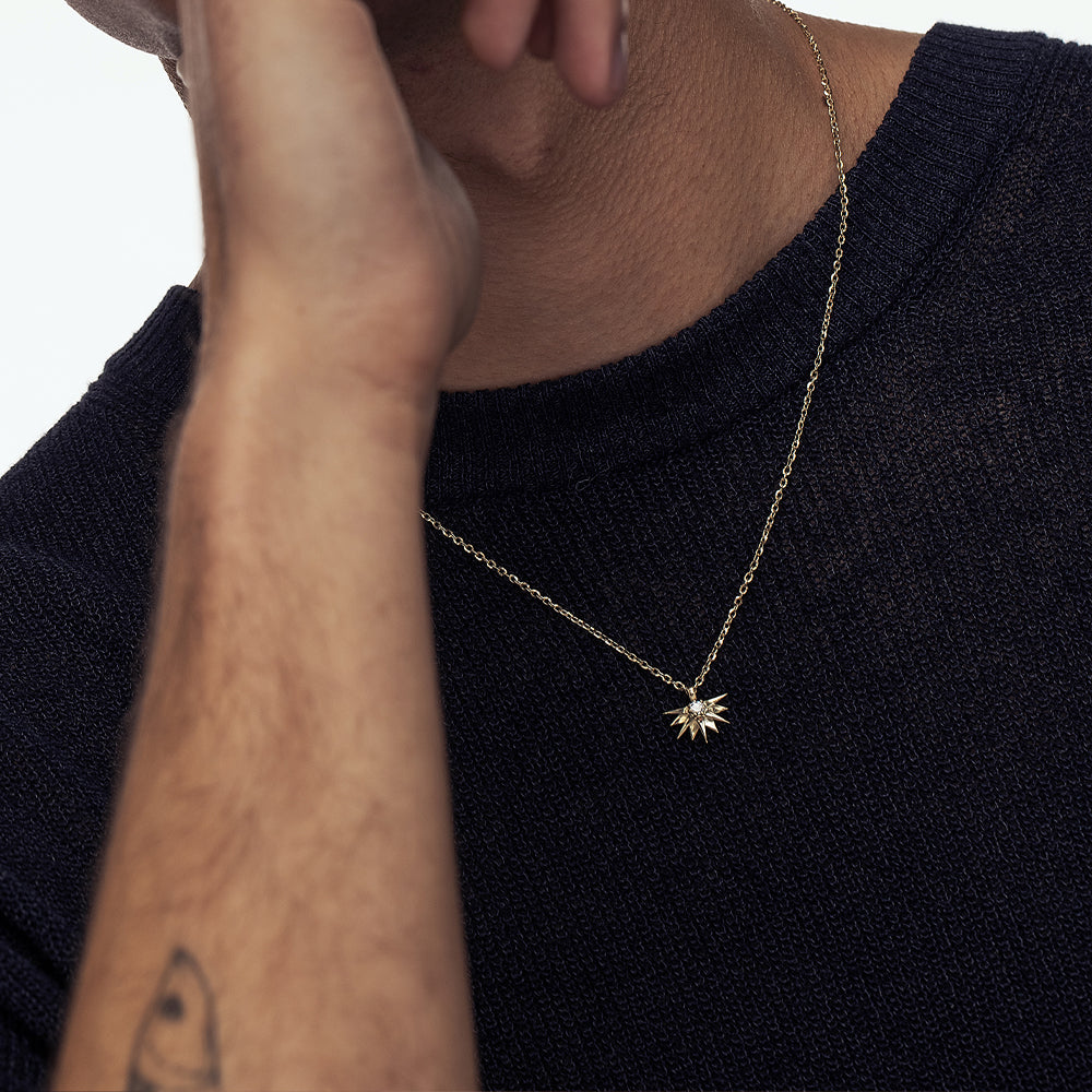 A special gold chain with a large half sun pendant