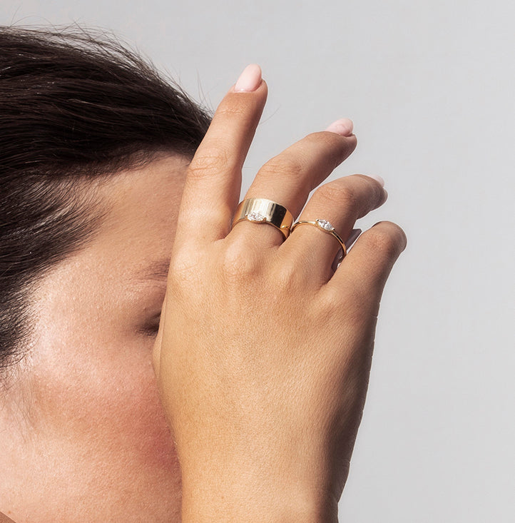A horizontal marquise diamond ring
