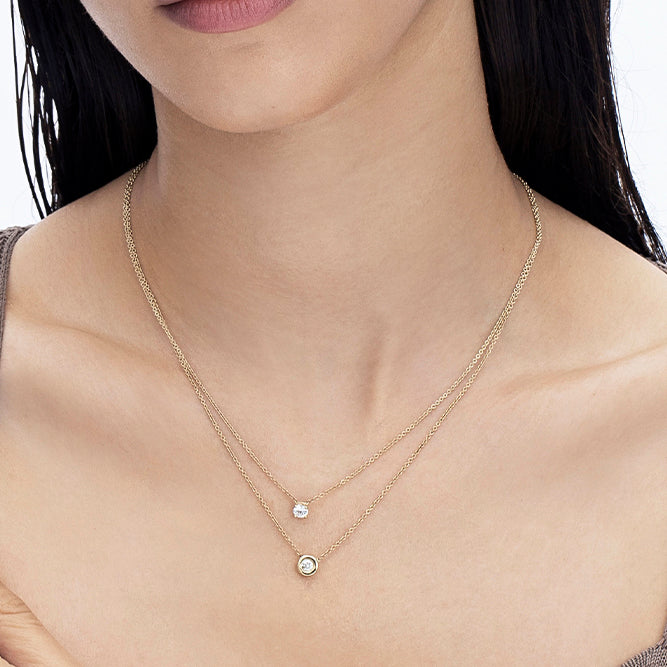 Gold chain with a laboratory diamond in a classic design 30 points