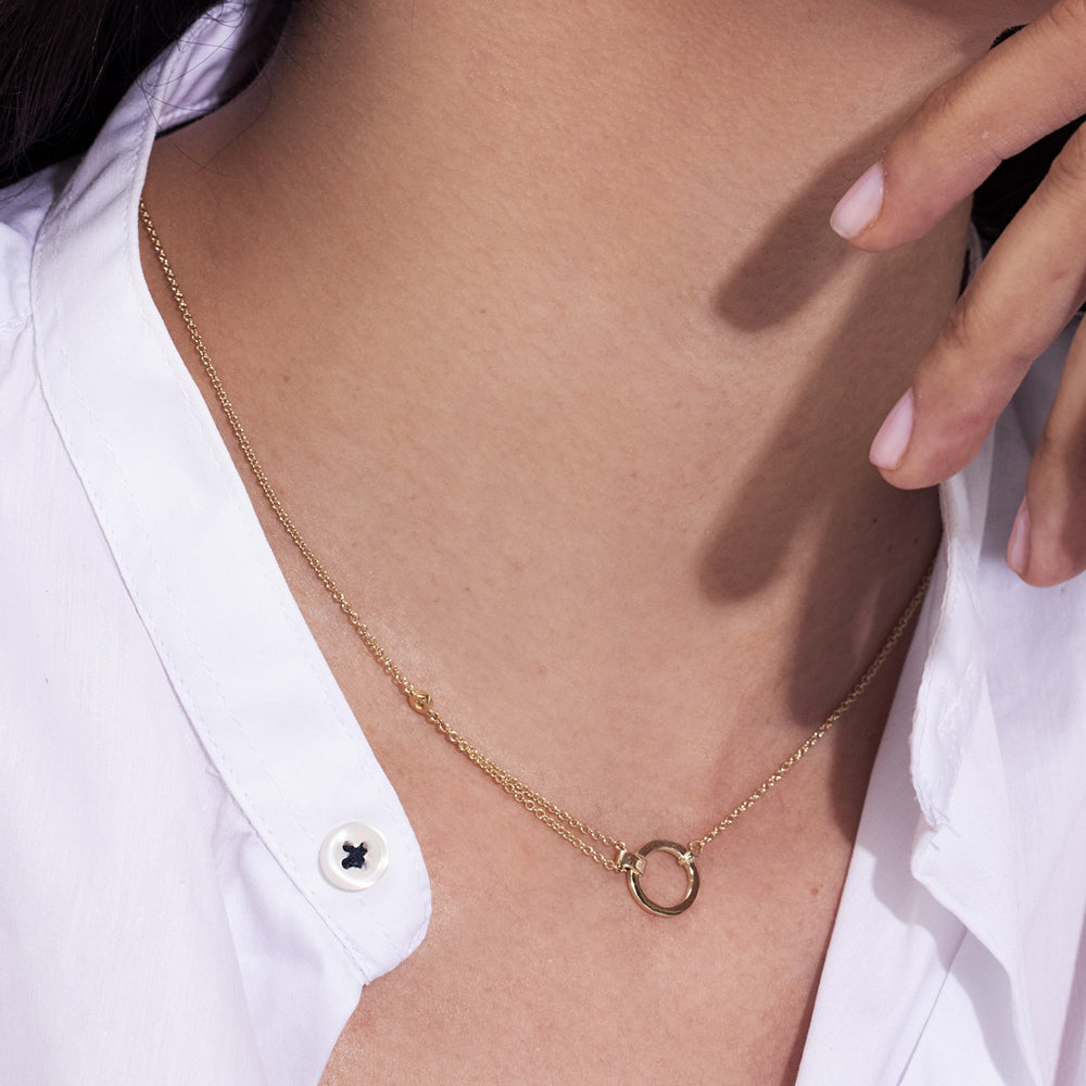 A thick, asymmetric and special gold chain, with a modern and impressive design. Diamond encrusted