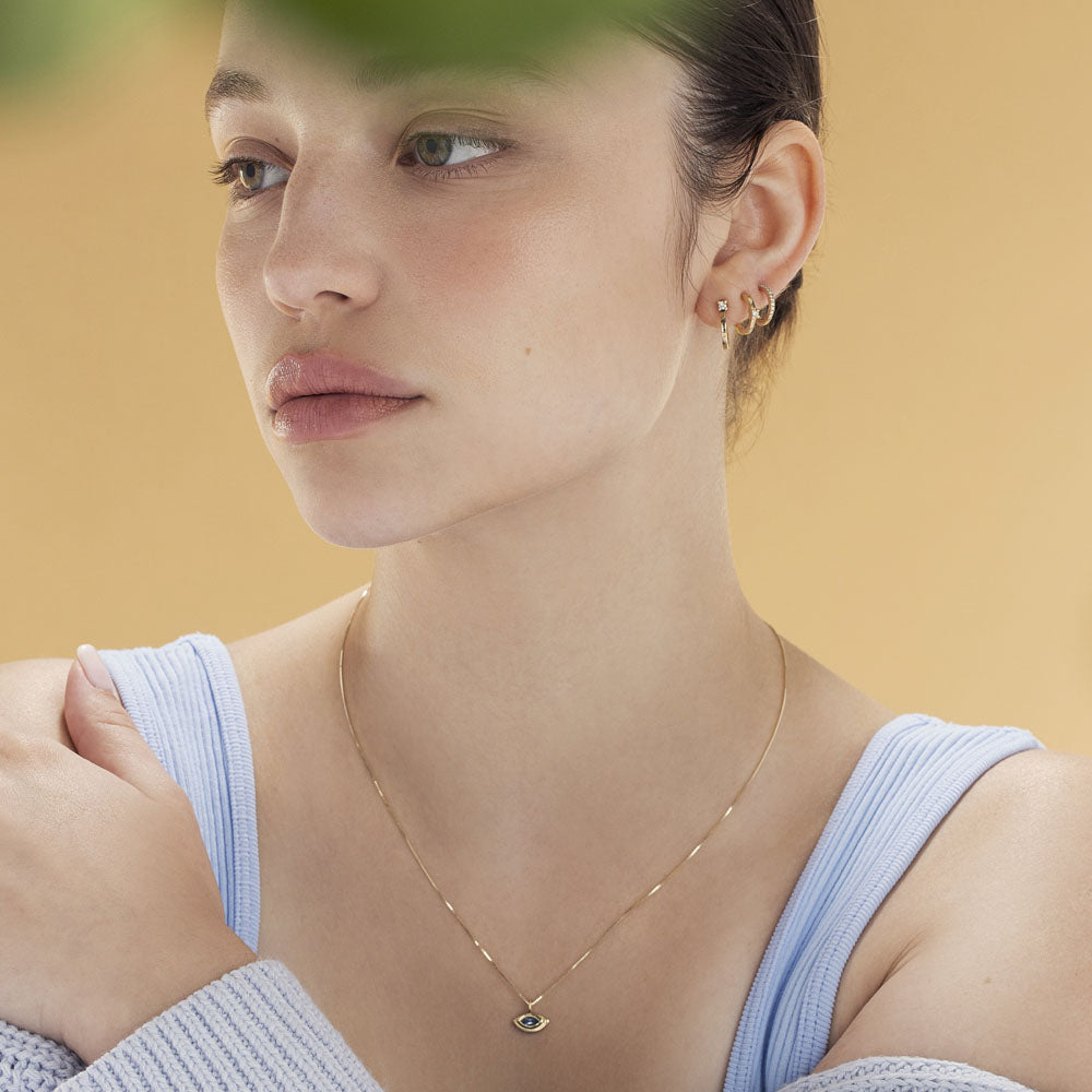 Classic small hoop earrings studded with white diamonds
