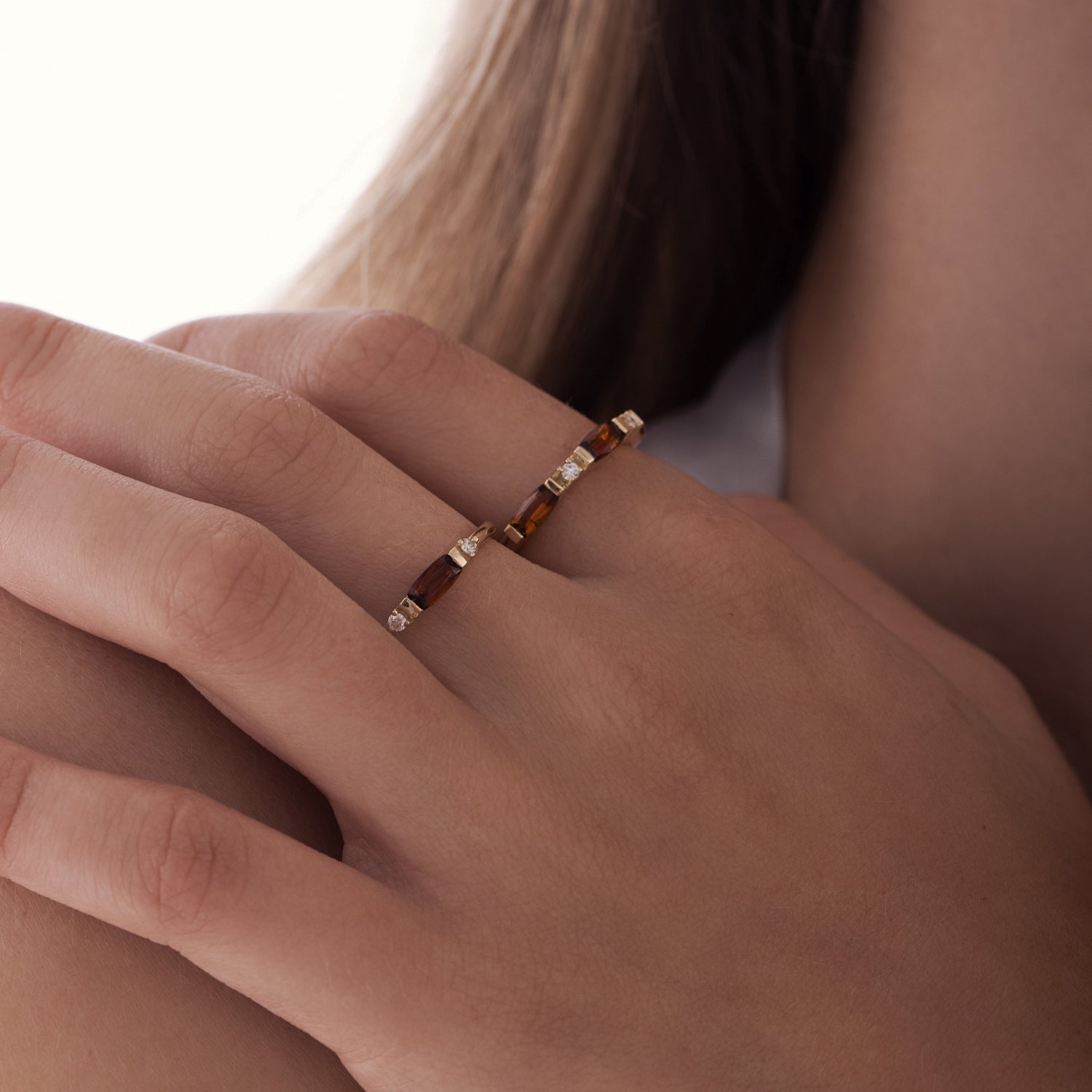 A fine and special gold ring set with orange tourmaline and diamonds