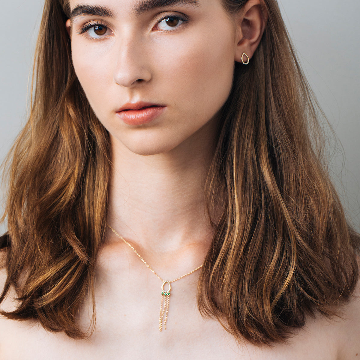 Drop-shaped gold and diamond earrings
