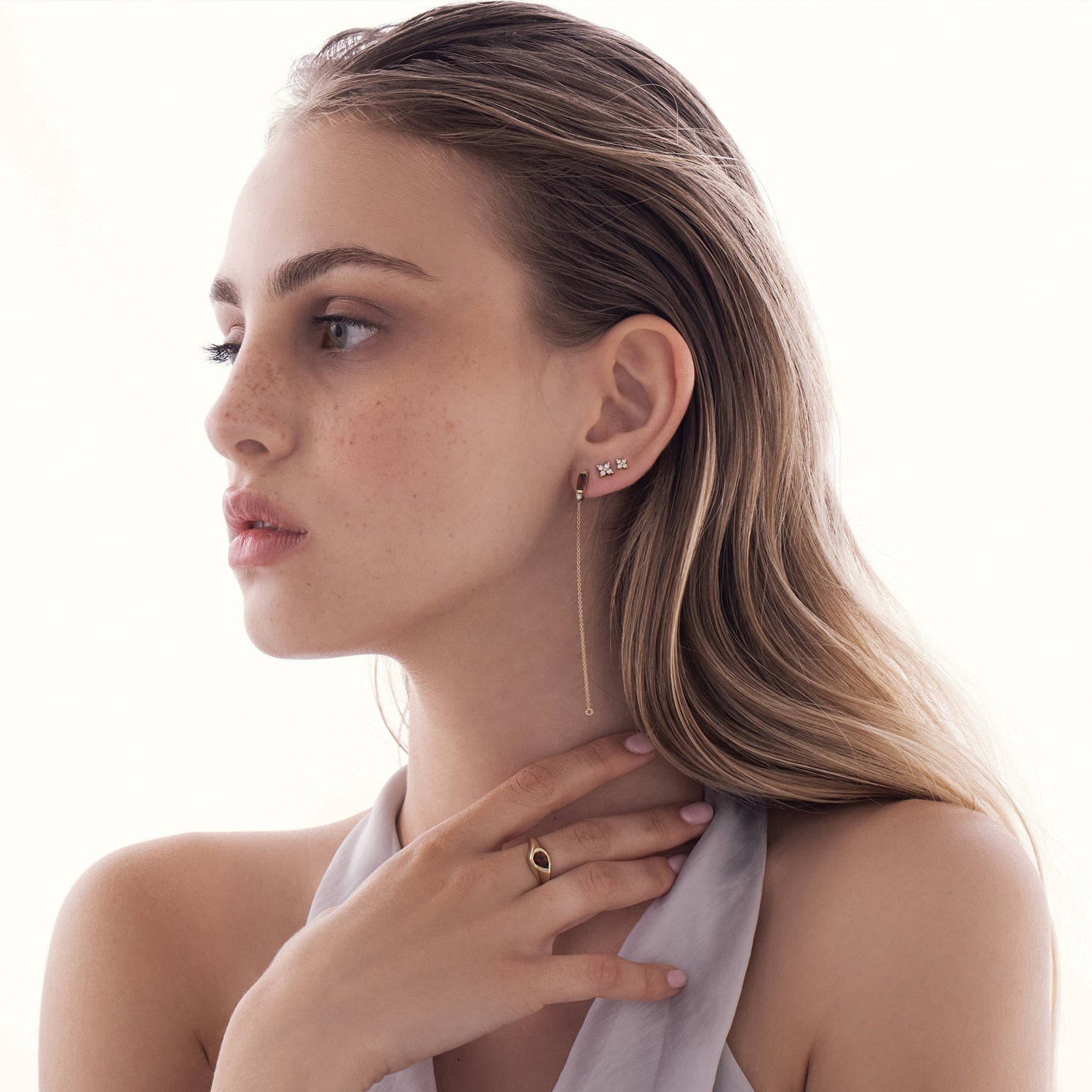 Drop signet ring, set with orange tourmaline