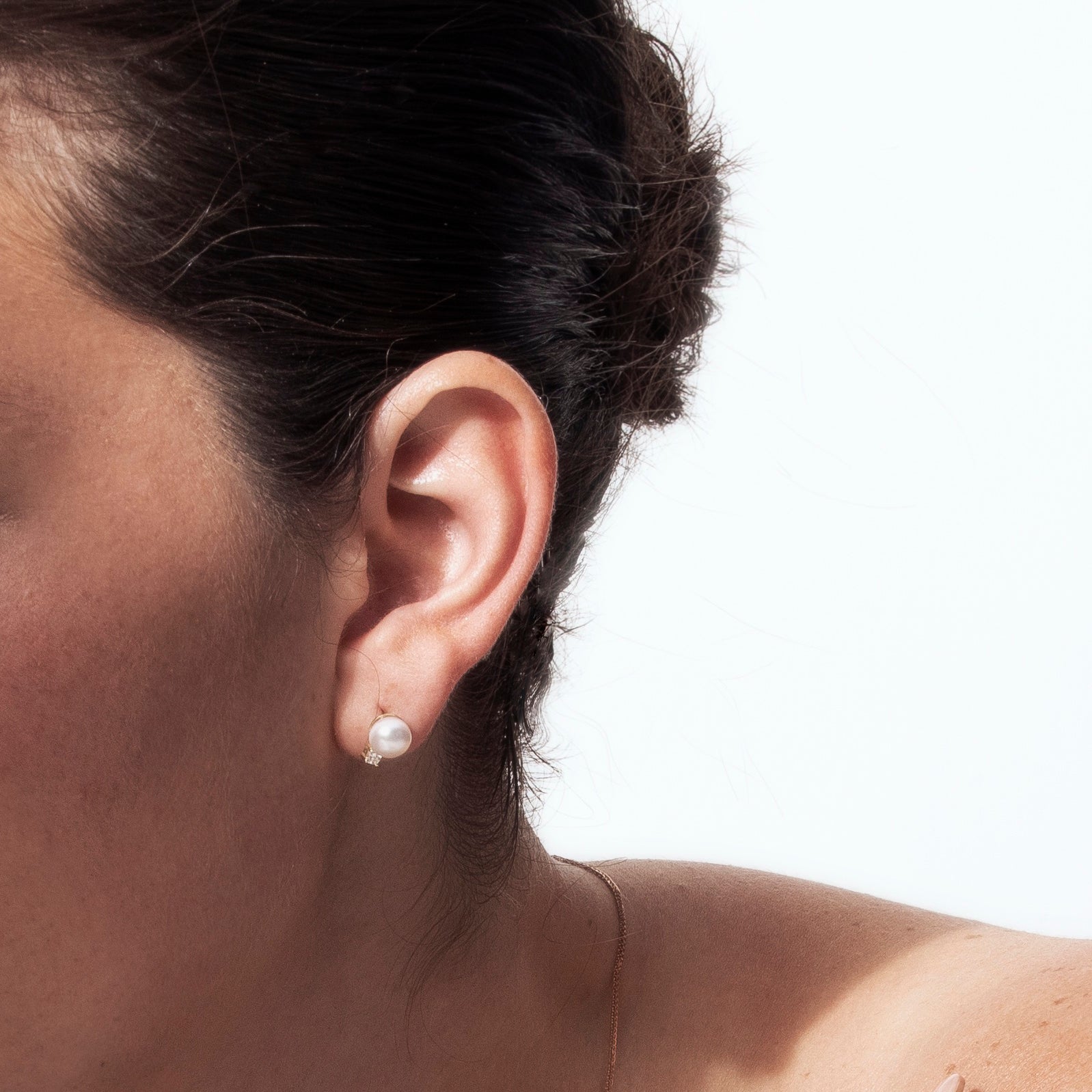 Large attached pearl and diamond earrings