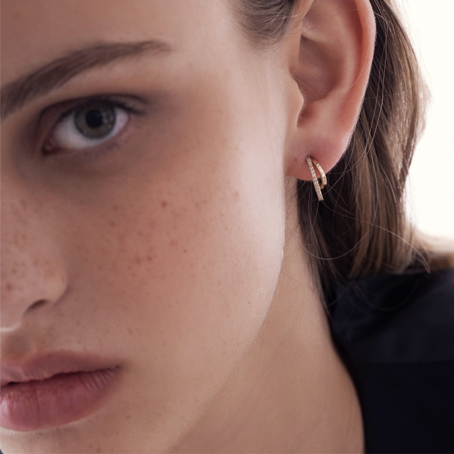 Special double hoop earrings studded with diamonds