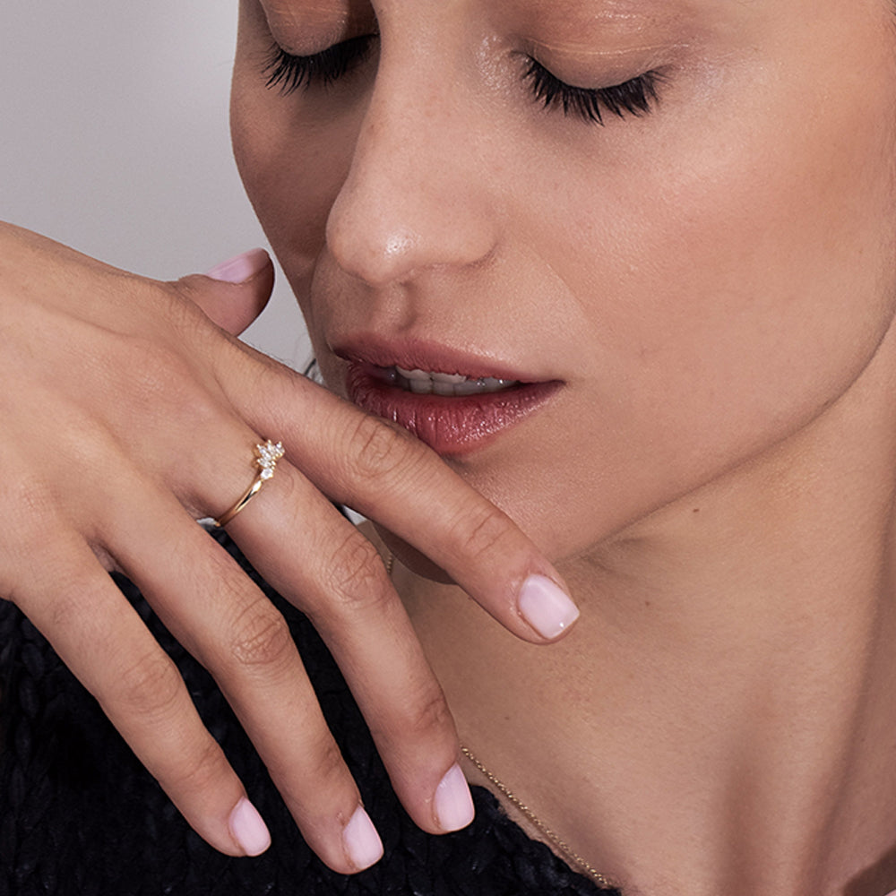 Gold ring set with 5 laboratory marquise diamonds