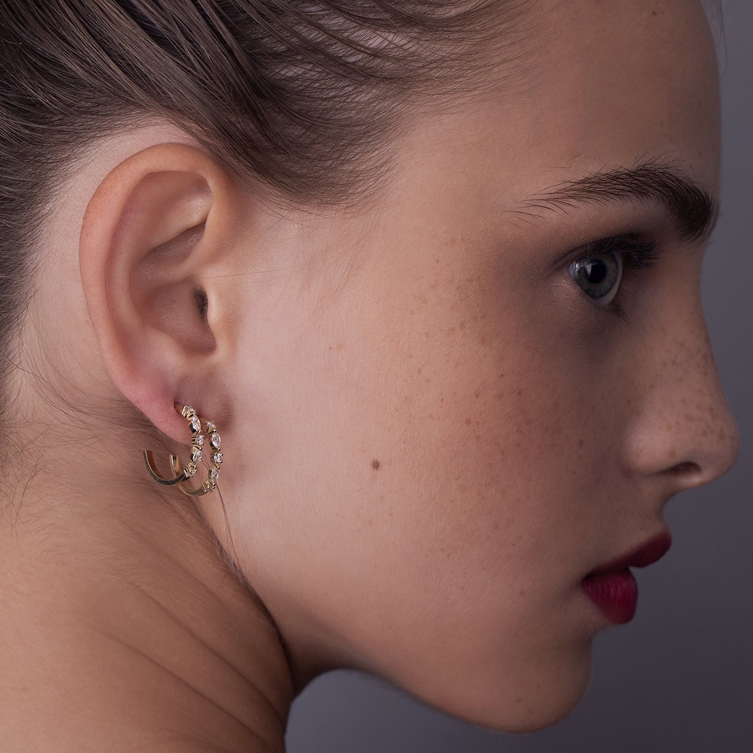 Special gold hoop earrings set with marquise-cut laboratory diamonds