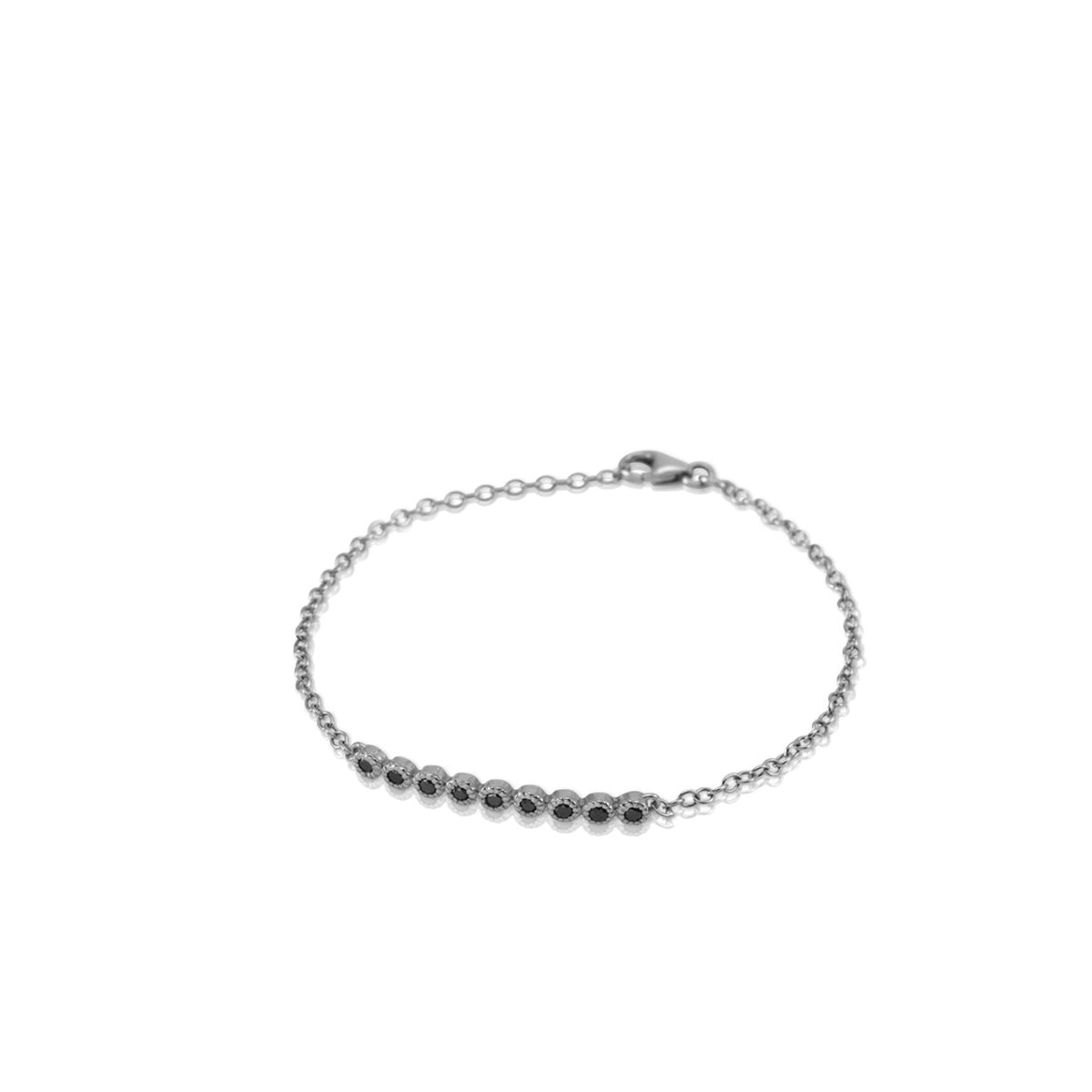 Gold bracelet set with 9 black diamonds