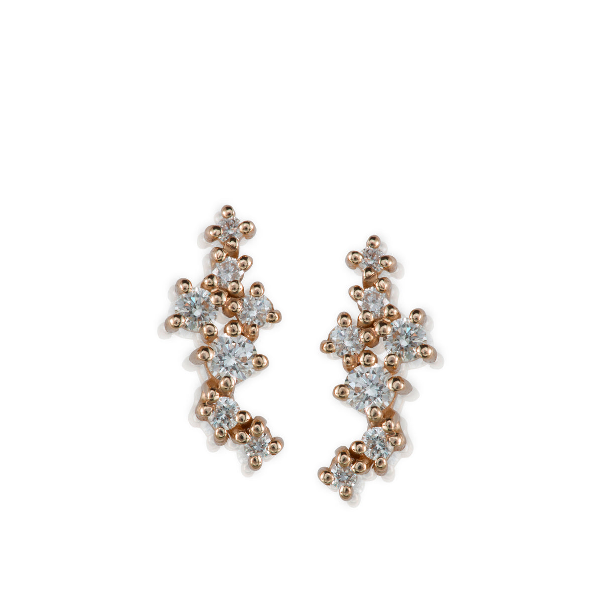 Tight gold earrings studded with diamonds of varying sizes