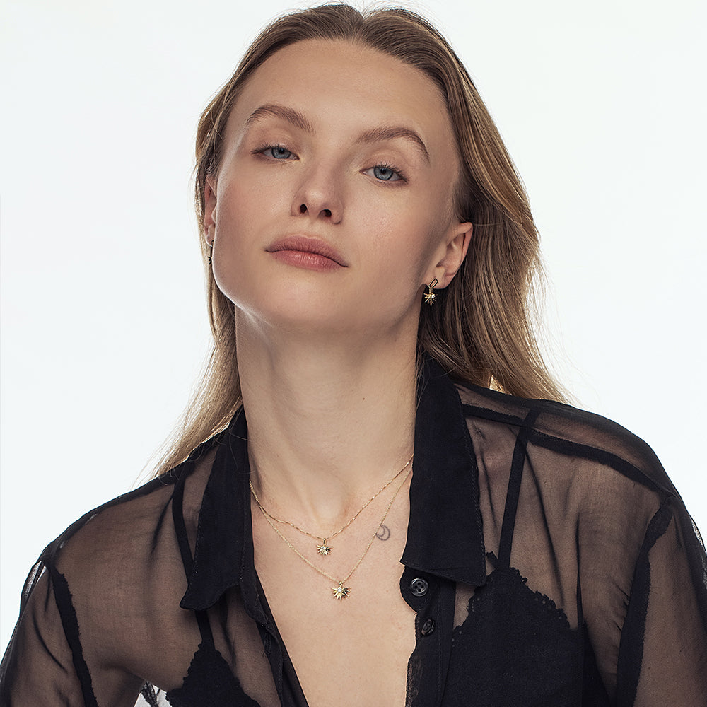 Hanging half-sun hoop earrings studded with laboratory diamonds