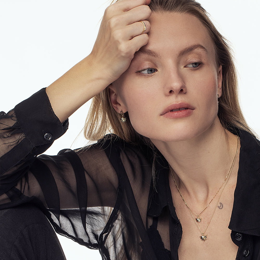 Hanging half-sun hoop earrings studded with laboratory diamonds