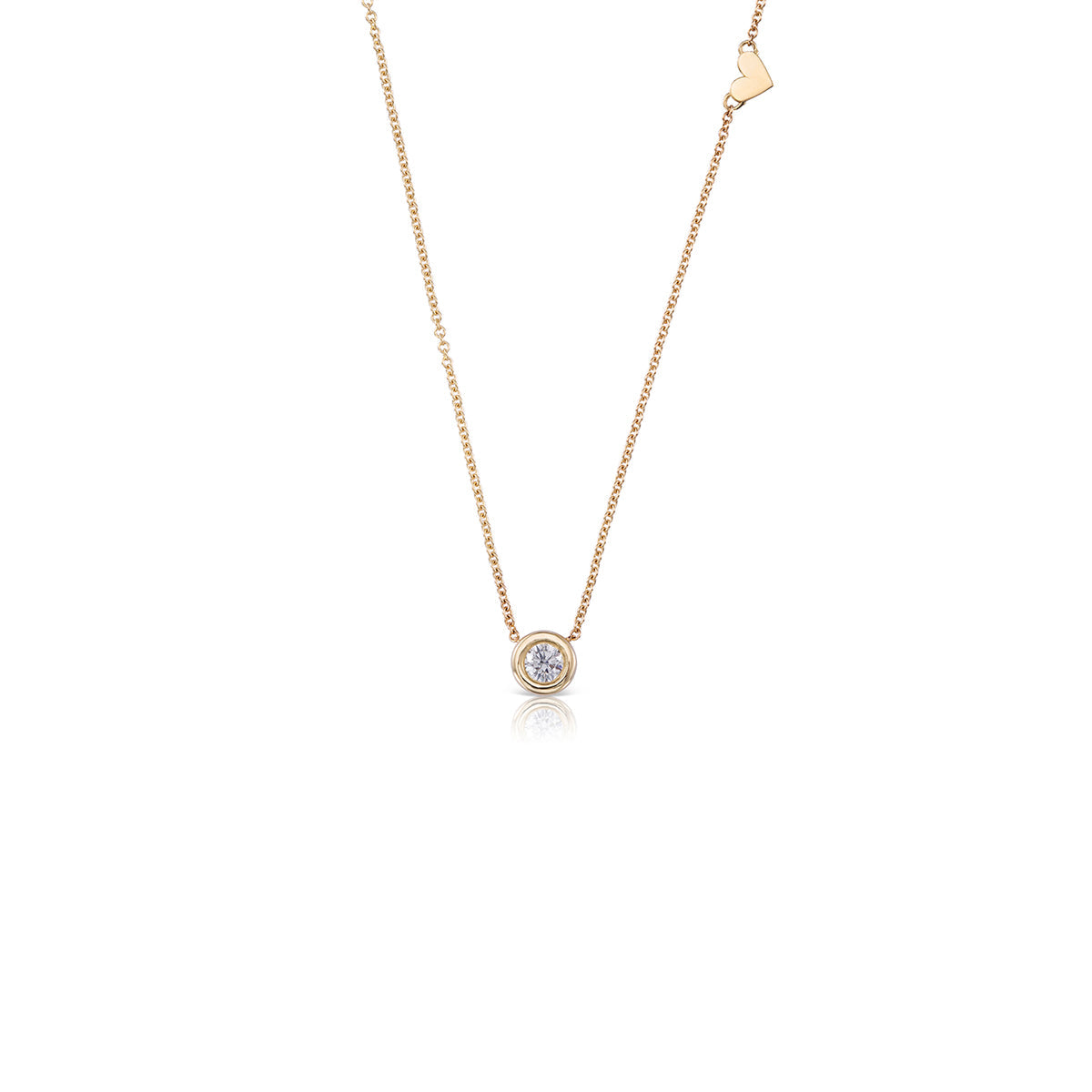A 30 point lab diamond studded gold chain with a heart pendant on the side