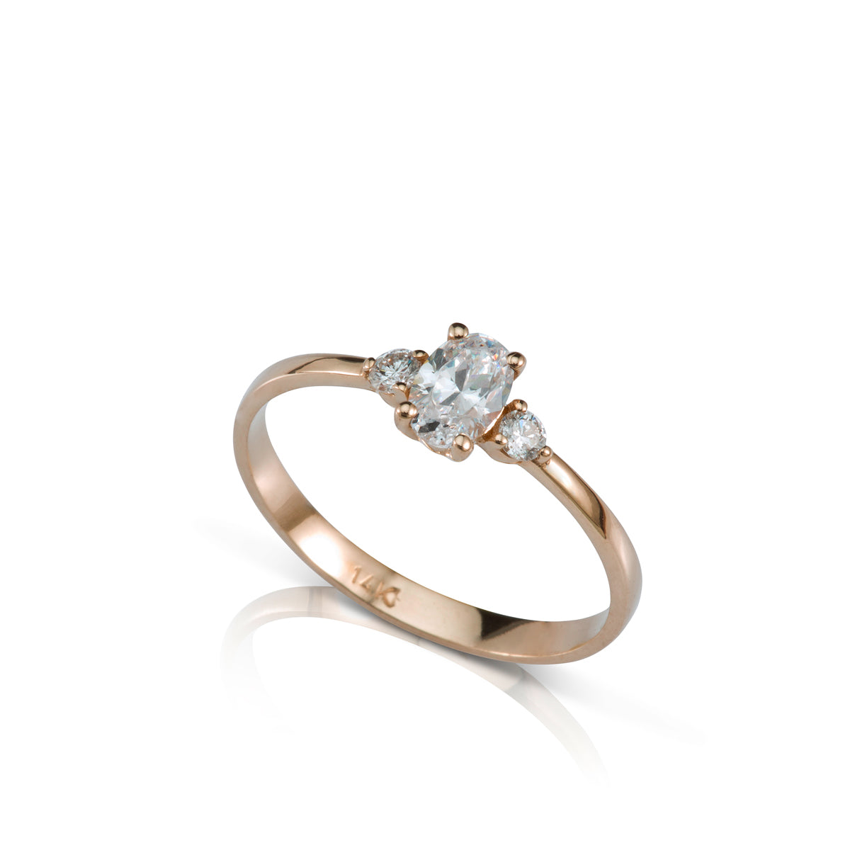 Engagement ring set with a 0.50ct oval diamond and 2 side diamonds