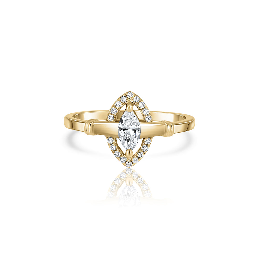 An impressive and rich gold ring set with a central marquise-cut lab diamond and diamond halo
