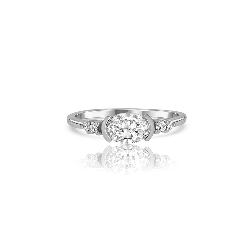 A unique engagement ring set with a laboratory diamond in a horizontal oval cut