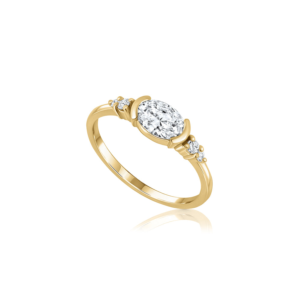 A unique engagement ring set with a laboratory diamond in a horizontal oval cut