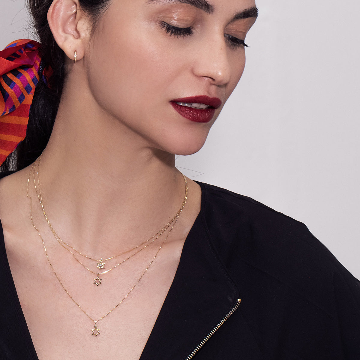 Gold necklace with a small Star of David pendant, 8 millimeters wide, 14 carat gold