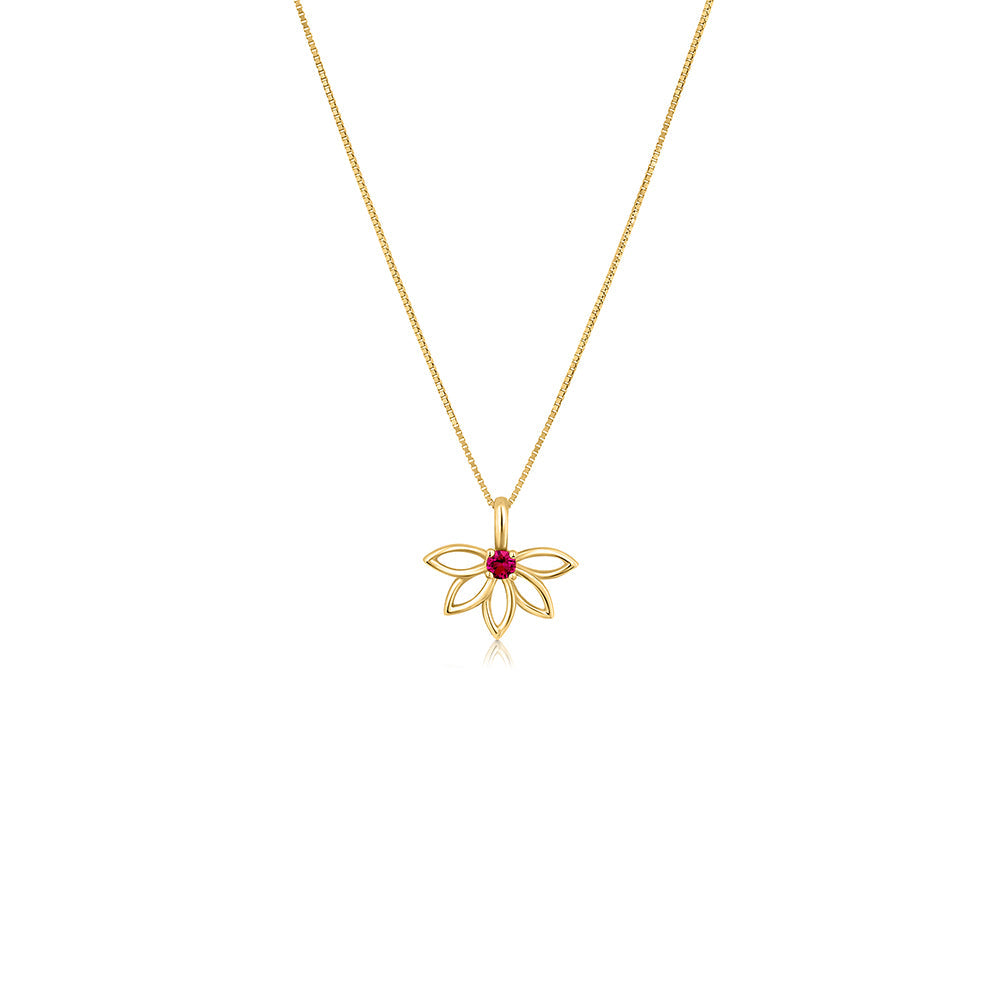 A gold necklace with a flower design, delicate, studded with rubies