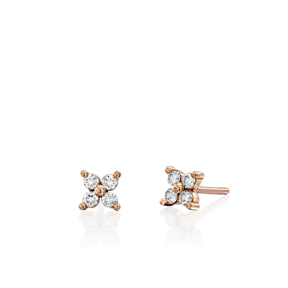 Tight gold earrings studded with 4 diamonds