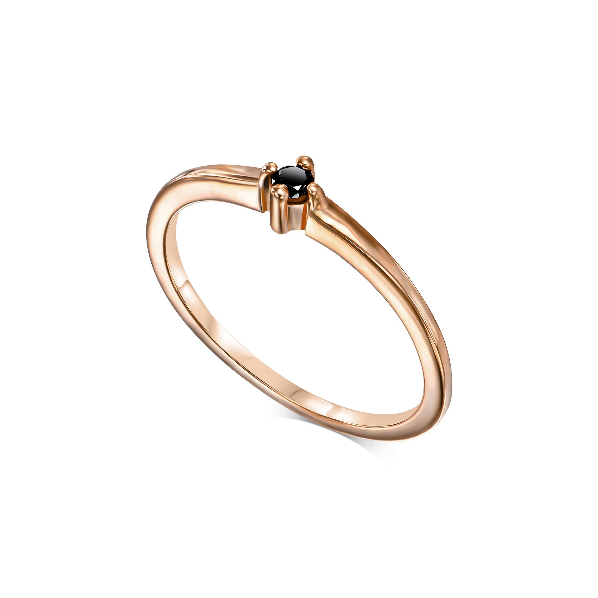 A delicate solitaire ring set with a black diamond weighing 5 points