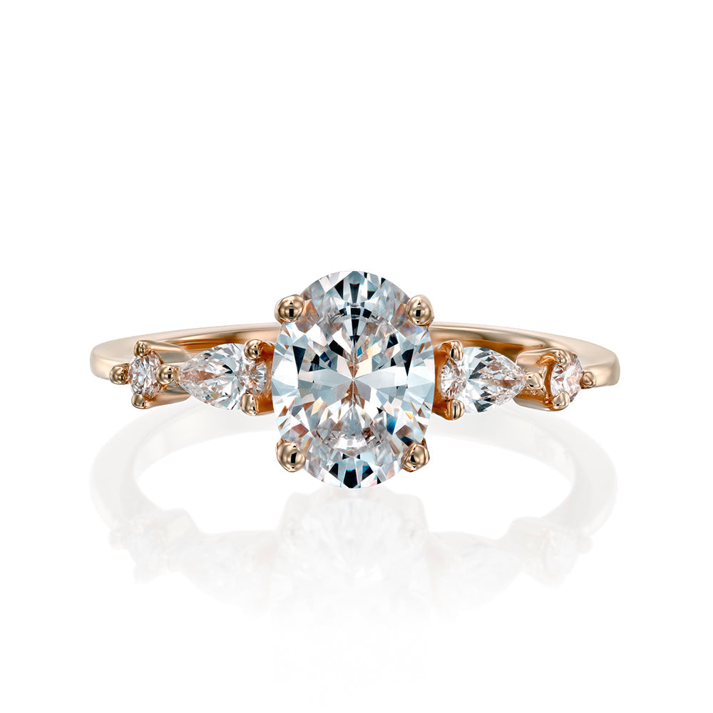 1.00 carat diamond ring combined with drop cut diamonds and round diamonds