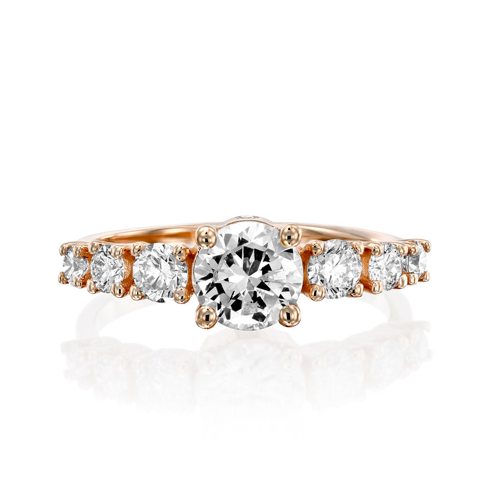 Engagement ring set with a central round diamond 0.90ct and 6 side diamonds