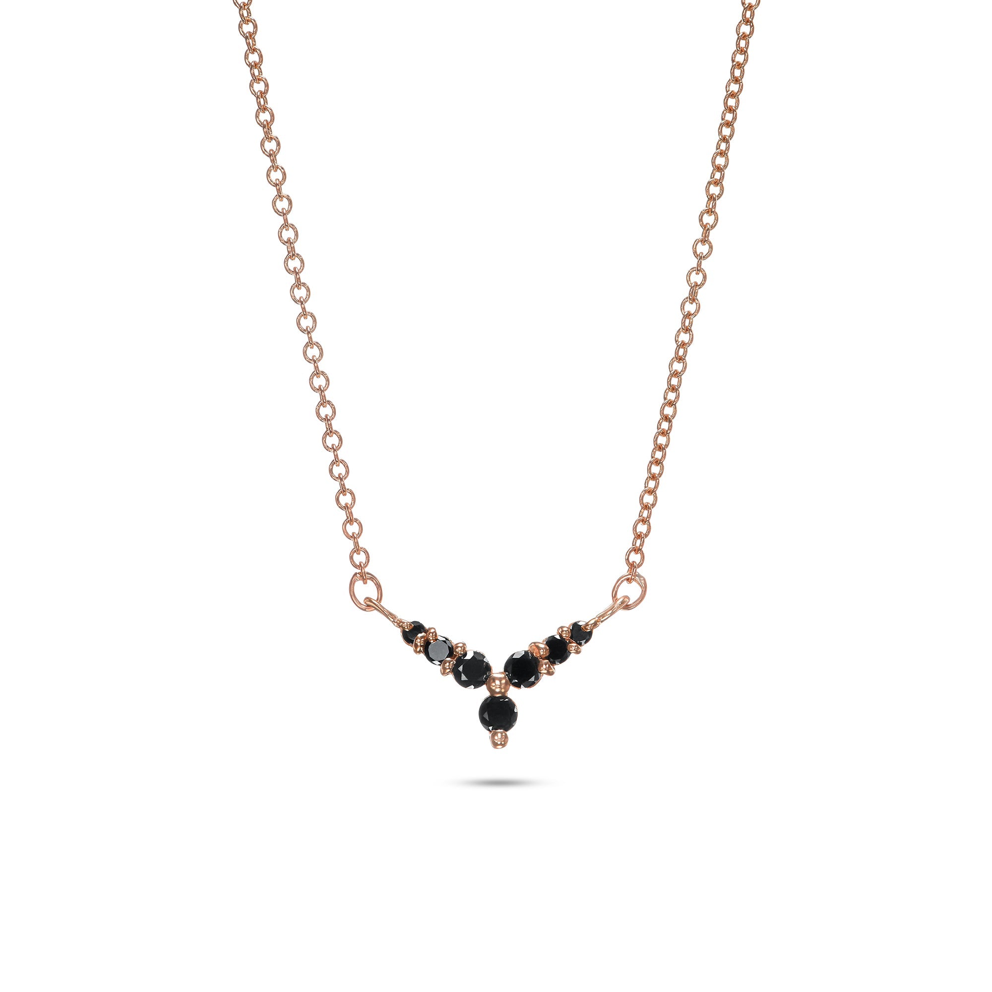 Gold and black diamond necklace with V pendant in a flower design