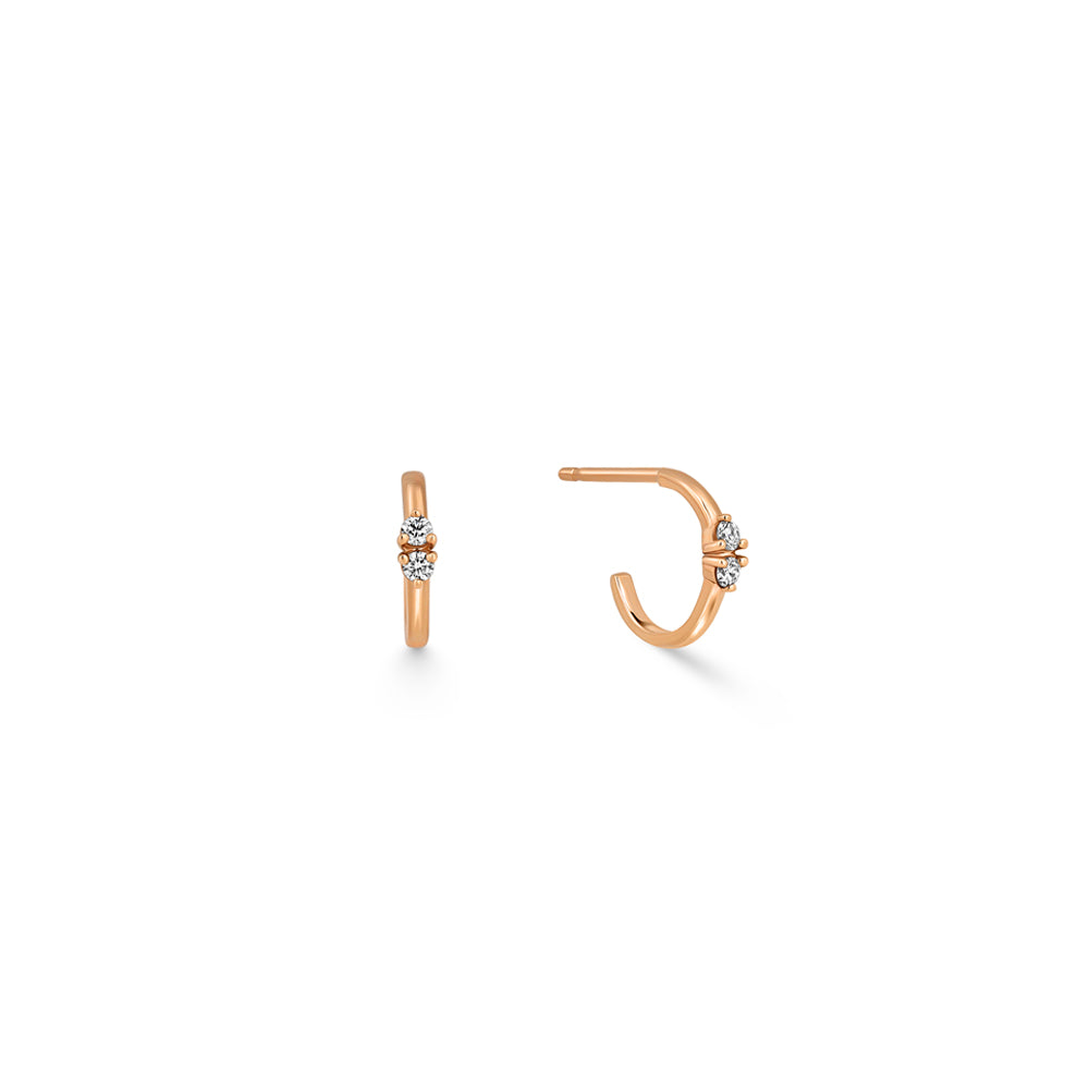 Small gold hoop earrings set with 2 diamonds