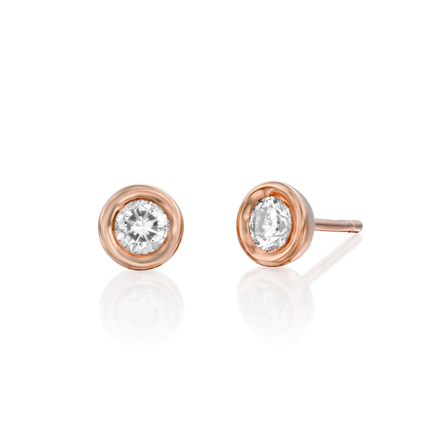 40 point attached diamond earrings set in a gold frame