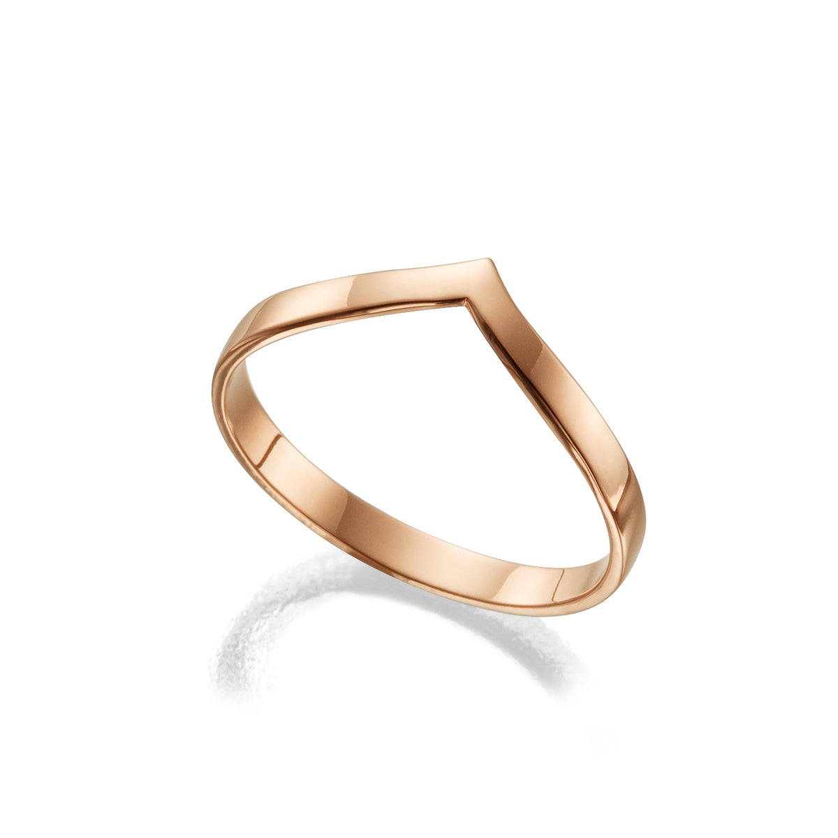 A gold ring in the shape of an arrow