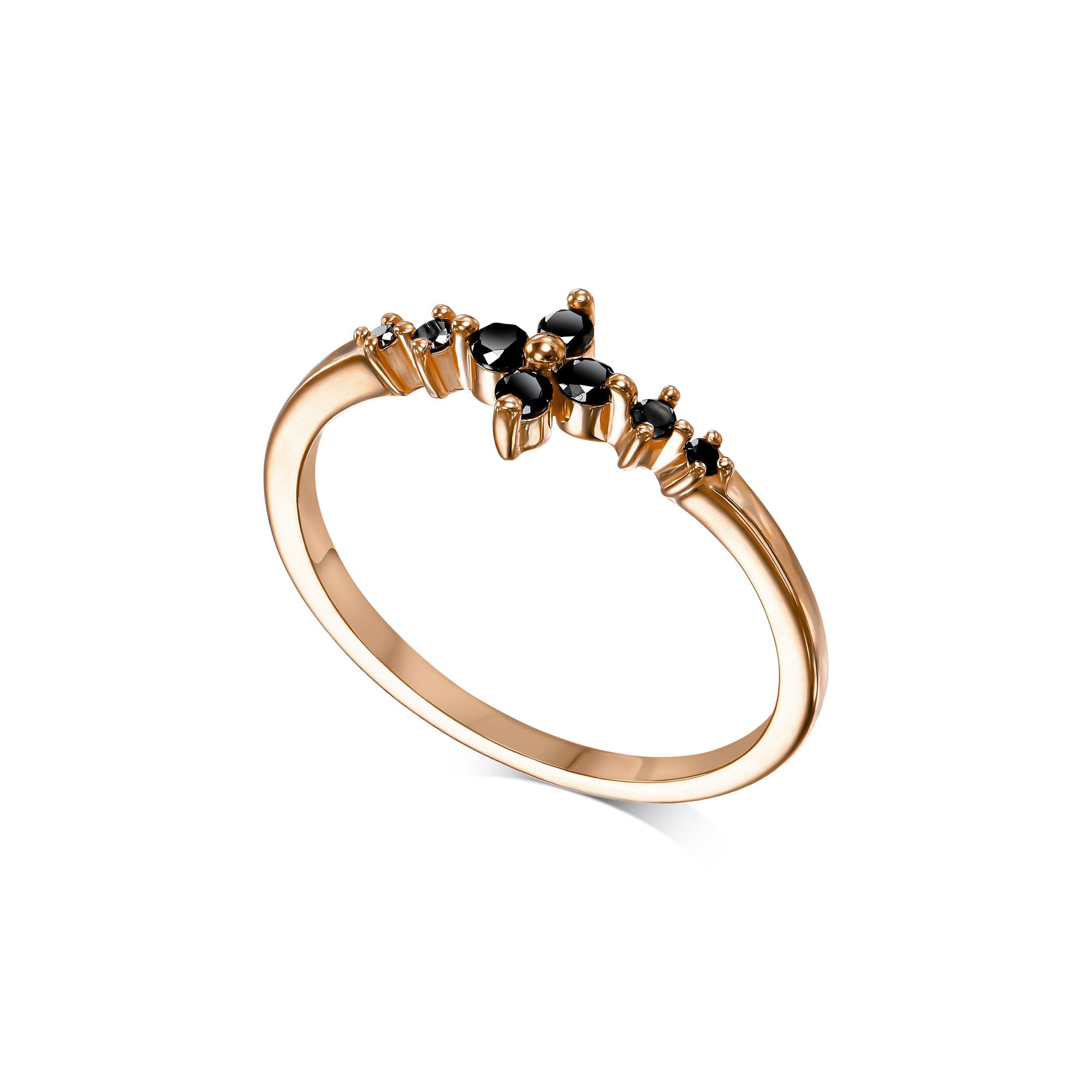 A delicate and thin gold ring set with black diamonds in the shape of a central flower and side diamonds