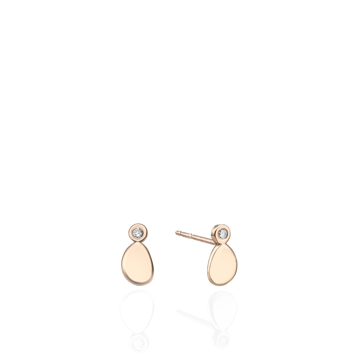 Gold attached earrings with diamonds in an amorphous point design