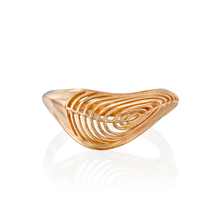 An impressive asymmetric gold ring in a wave shape