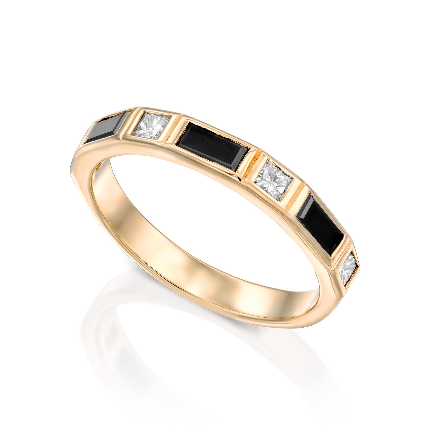 A semi-eternity ring set with baguette-cut black diamonds and princess-cut white diamonds