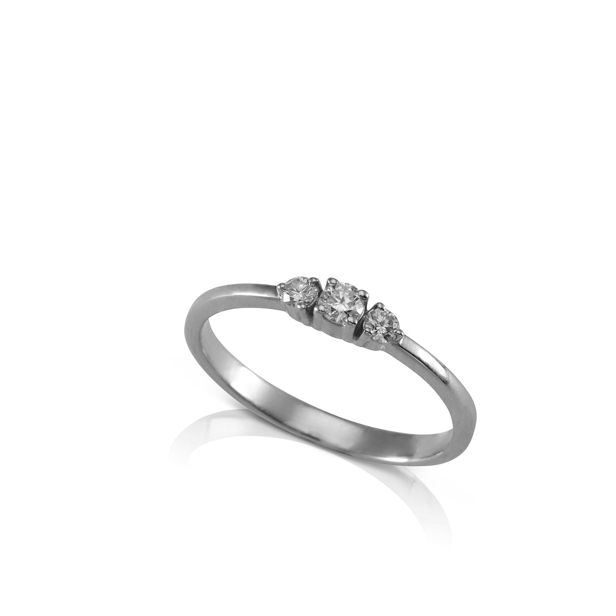 A delicate three diamond ring