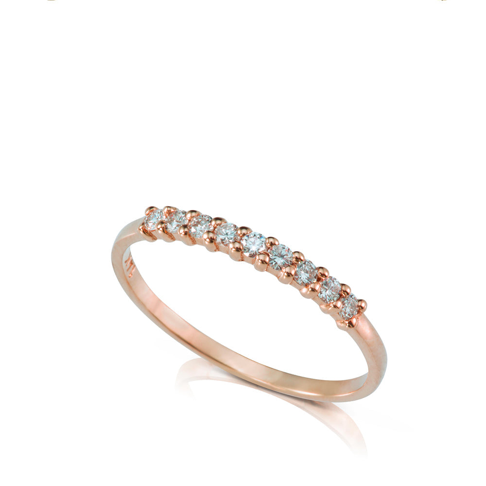 Ring with a row of diamonds in a prominent setting